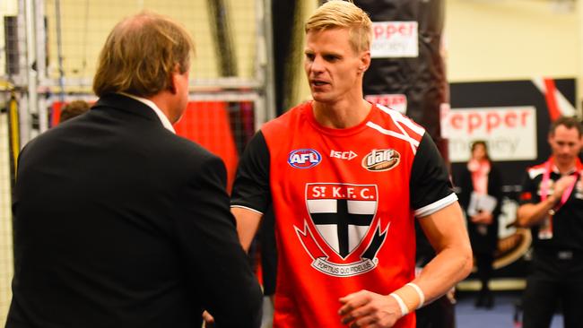 Former coach Grant Thomas presented Nick Riewoldt with his jumper before his 300th game. Picture: saints.com.au