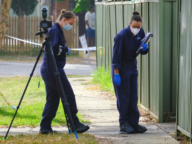 Forensic police scour the scene. Picture: NCA NewsWire / Luis Ascui