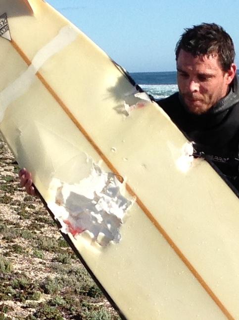 The damage to his board.