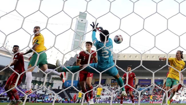 Harry Souttar scores against Indonesia. Picture: Lintao Zhang/Getty Images