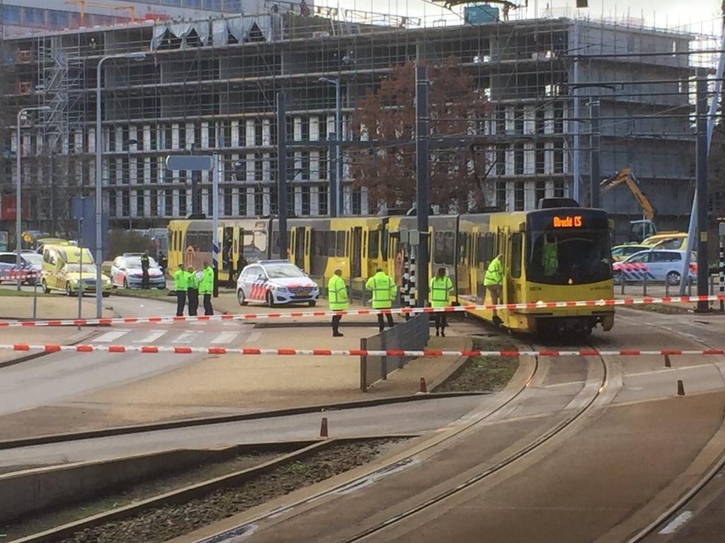 Emergency services surround the tram that was the scene of the shooting. Picture: John Maes/Twitter