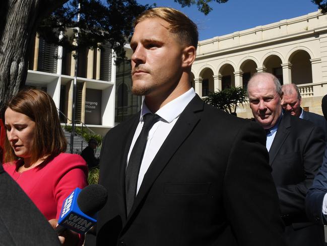 St George Illawarra Dragons player Jack de Belin (centre) pleaded not guilty to the rape charge. Picture: AAP/Dean Lewins