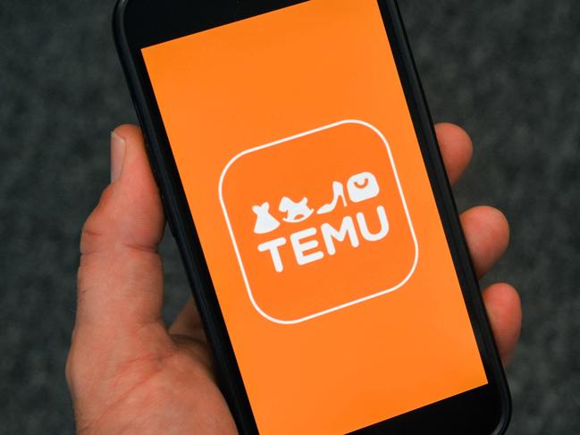 (FILES) This photo illustration shows the logo of fast fashion e-commerce company Temu displayed on a mobile phone in Brussels, on November 4, 2024. The US Postal Service (USPS) has said it is temporarily suspending inbound parcels from China and Hong Kong, evoking an angry accusation of "unreasonable suppression" from Beijing on February 5, 2025. US officials pointed to the growth of Chinese-founded online retailers Shein and Temu as a key factor behind this surge in shipments claiming the exemption in recent years  -- and the halt on February 4 could delay parcels from both companies from entering the country. (Photo by Nicolas TUCAT / AFP)