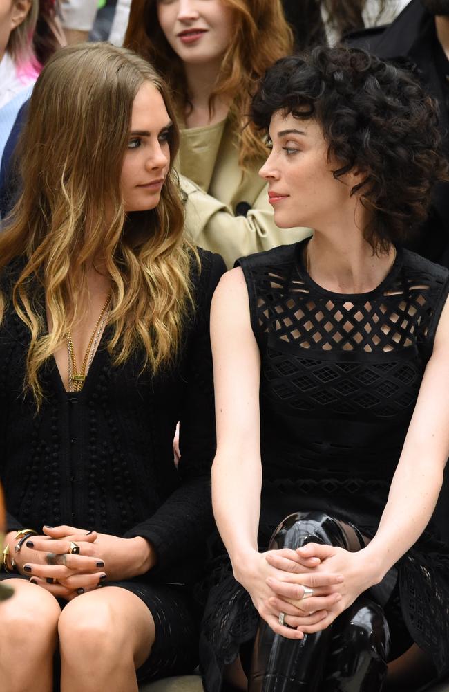 ‘Jetstar or Tiger?’ Cara with her partner, musician St Vincent. Picture: Rex Features / Splash News