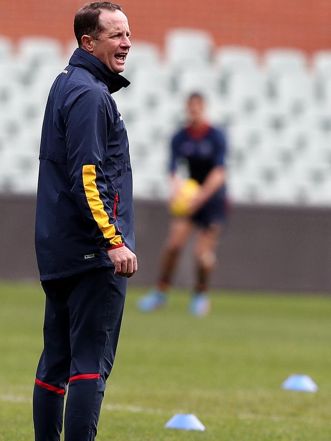 Don Pyke yells instructions to his players during training at Adelaide Oval on Wednesday, July 17, ahead of their Friday night clash with Essendon. Picture: Sarah Reed