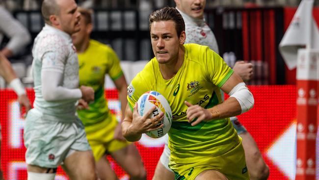 VANCOUVER, BC - MARCH 08: Lachie Anderson #12 of Australia scores in Match #31, Australia vs England (Cup QF 3) during the Canada Sevens, Round 6 of the HSBC World Rugby Sevens Series, held on March 8, 2020, at BC Place in Vancouver, Canada. (Photo by Allan Hamilton/Icon Sportswire via Getty Images)