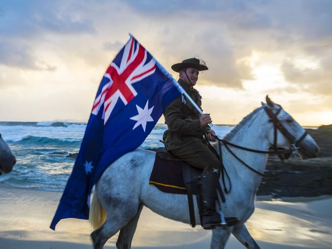 Member of the Light Horse brigade takes part in the Anzac Day dawn service held by the Currumbin RSL at Currumbin Surf Life Saving Club on the Gold Coast. Picture: AAP/Glenn Hunt.