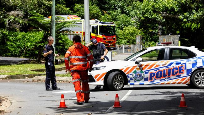 Queensland Fire and Emergency Services, State Emergency Services and police co-ordinate a search for a missing man at Crystal Cascades swimming hole in the Redlynch Valley. Picture: Brendan Radke