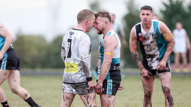 Harley Short of Roxburgh Park and Lucas Failli of Roxburgh Park get to know each other.Picture: George Sal