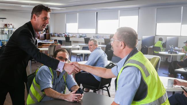 The independent MP for Wakehurst, Michael Regan, speaks with drivers at the Keolis Downer bus depot at Brookvale on Friday. Picture: NSW Government