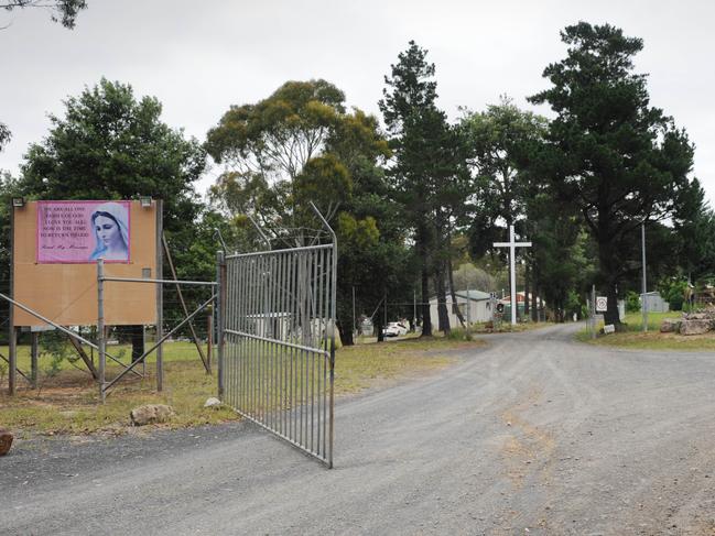 Little Pebble.Bettina Kamm ex-wife of the 'Little Pebble' religious order leader, William Kamm, speaking out at the front gate of the compound at Bangalee near Nowra. Pic by Simon Bullard