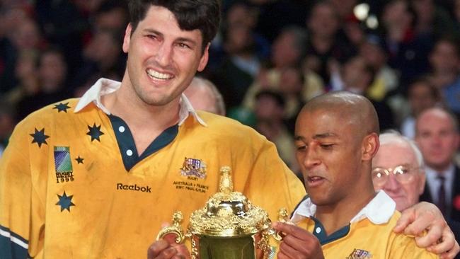 Wallabies captain John Eales and halfback George Gregan with the Rugby World Cup in 1999.