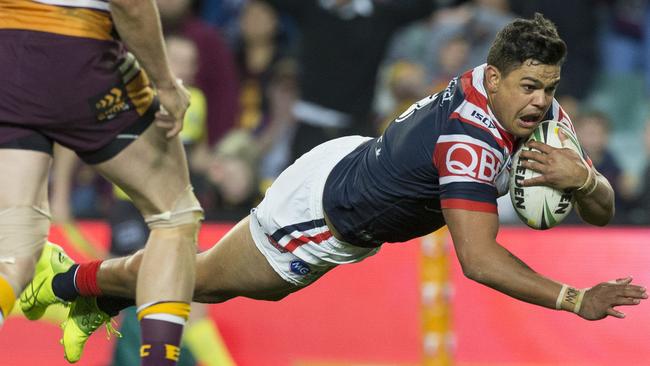 Latrell Mitchell scores the matchwinning try for the Roosters.