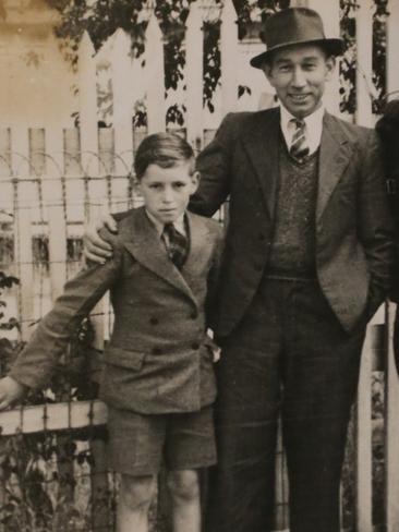 Bruce Goodluck, aged 12, with his father Harry.