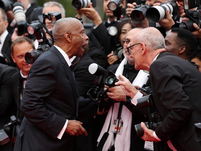 Denzel Washington screams at a photographer who continually grabbed him. Picture: Getty Images