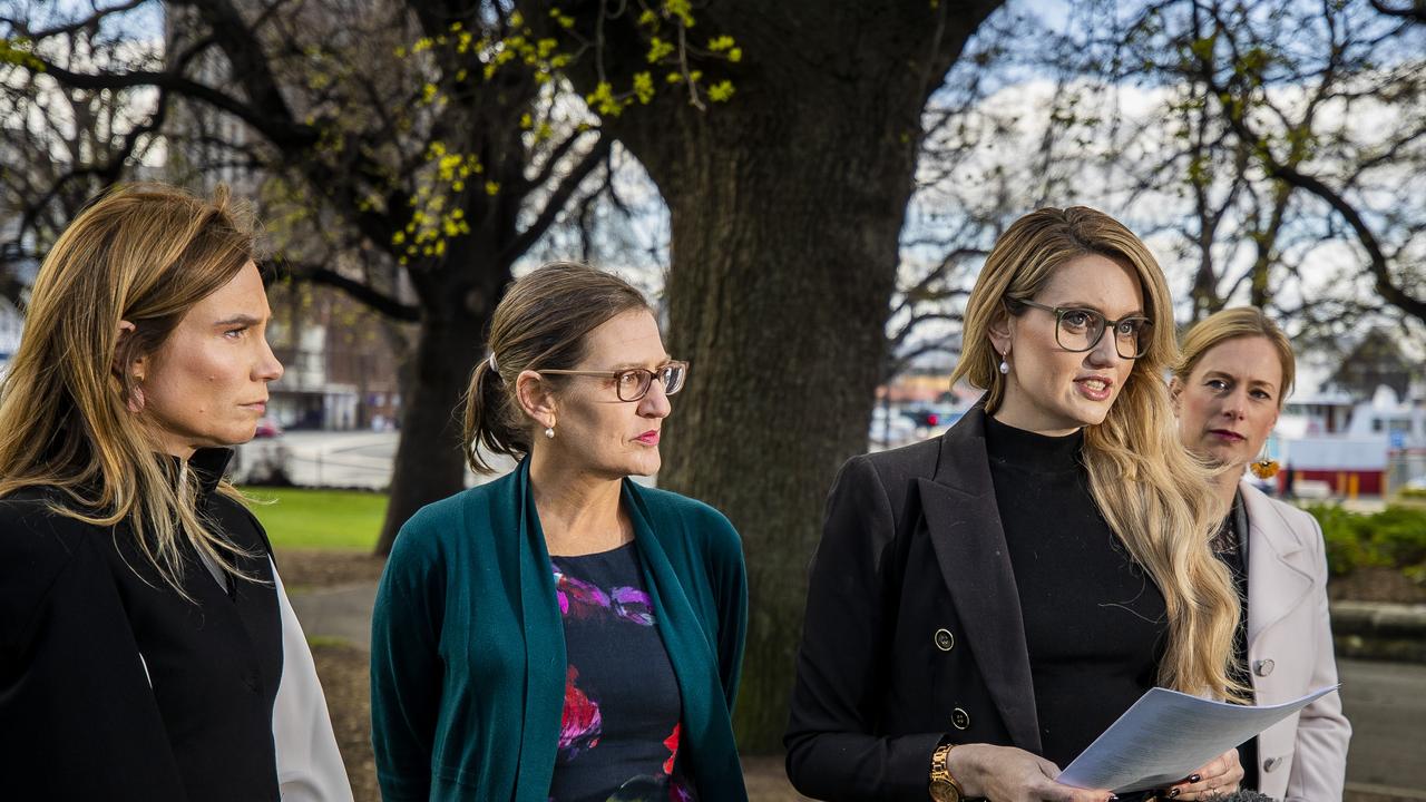 Alysha (surname withheld), with Kristie Johnston, Cassy O'Connor and Rebecca White, holds a press conference on Parliament lawns after having long running difficulties with sexual assessment claims while working at Ashley Youth Detention Centre. Picture: Richard Jupe