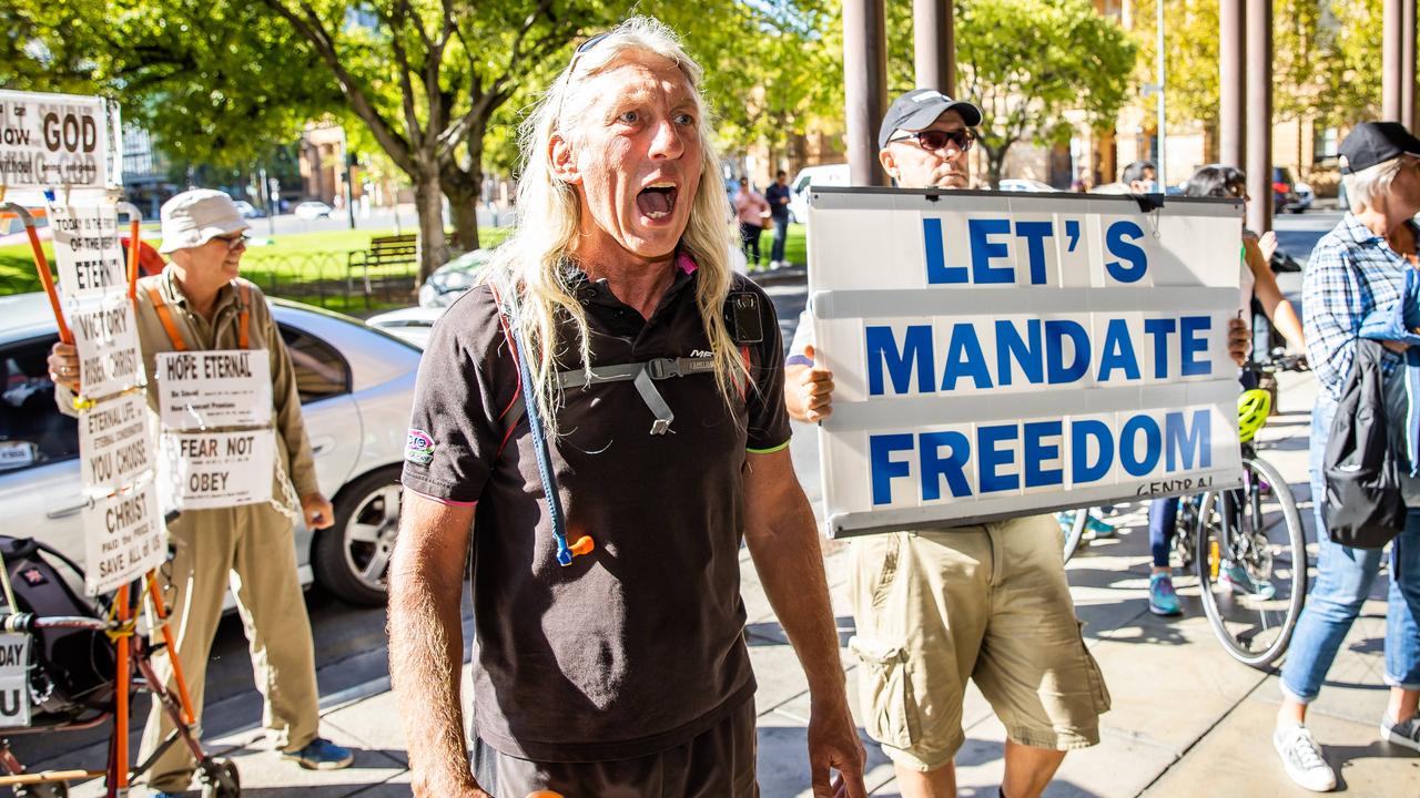 Supporters and protesters outside the Supreme Court ahead of the trial. Picture: Tom Huntley