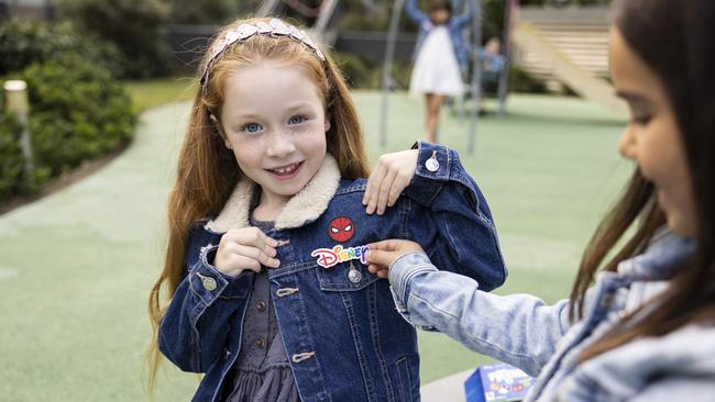 Maya Higgins and Imogen Jones enjoying decorating their denim jackets. Picture: Ken Leanfore