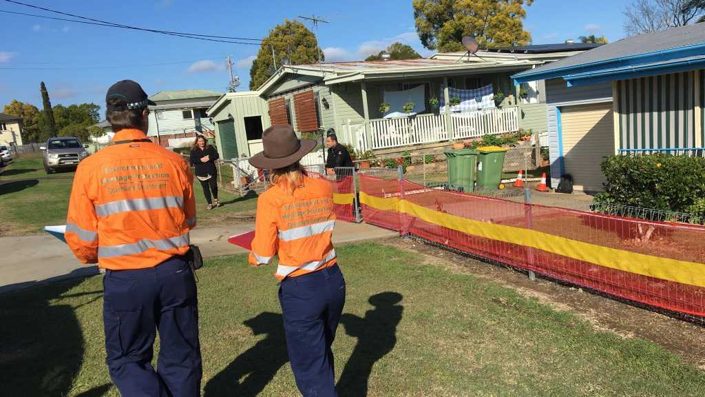 Officers from the Environment Heritage and Protection Department at the property to inspect the sinkhole. Picture: Helen Spelitis