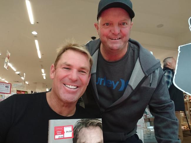 Shane Warne at a book launch with Mentone Grammar cricket teammate Wayne Fuller.