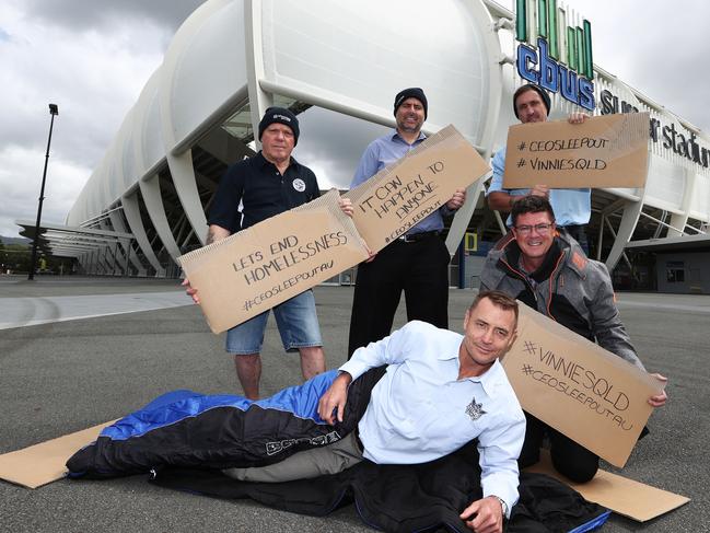 Titans CEO Steve Mitchell (at front) with (L-R) Robin Aarons, Kris Martin, Rob Molhoek and Michael Eklom preparing for The St Vinnies Sleepout at Cbus Stadium. Photograph: Jason O'Brien