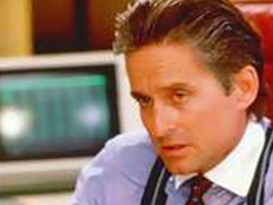 Actor Michael Douglas portraying Gordon Gekko in a scene from the 1987 'Wall Street'.