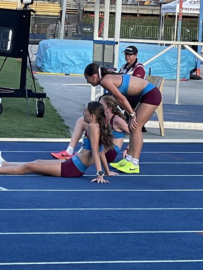 Piper Anderson, PBC SHS school mate Lola Wight and a third teammate after the recent QRSS championship. On Day 3 at the All Schools today she won the 3000m.