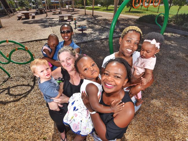 (Clockwise from front) Amanda Mlalazi with Emeli, Nicole and Spencer Tehan, Wadzanai and Rufaro Mutauranwa, Sibonile Mlauzi and Reign Ronewa Ndou in Point Cook. Picture: Tony Gough