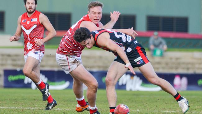 Former North Adelaide forward Chris Barns (middle) booted seven goals on return for Morphettville Park against SMOSH West Lakes. Picture: Brenton Edwards