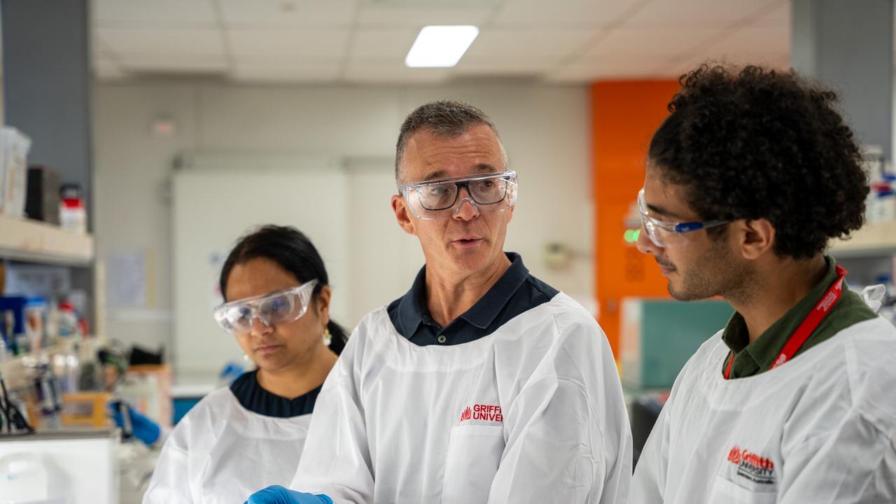 Professor James St John and his team. Picture: Griffith University