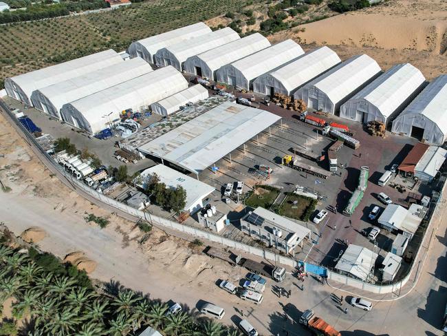 Humanitarian aid trucks arriving from Egypt after going over the Rafah border crossing. Picture: AFP