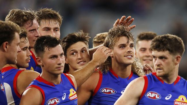 Teammates congratulate Smith (Photo by Dylan Burns/AFL Photos via Getty Images)