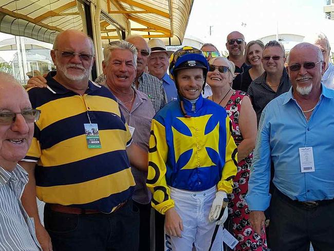 Musgrave Hills Bowls Club player Mike Morgan (navy and yellow strip shirt) with fellow owners and jockey Ryan Wiggins who rode the Scott Morrisey-trained Musgrey Hill to fourth in the Jupiters Fillies and Mares Maiden Handicap (1300m) on the Gold Coast on Wednesday, January 25, 2017. Picture supplied.