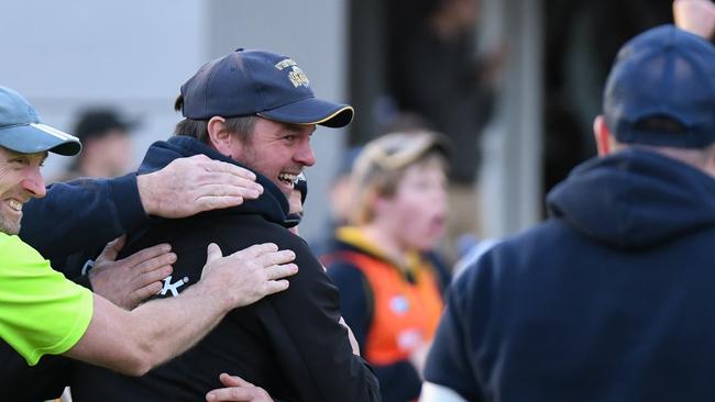 Whittlesea coach Jim Atkins' smile on the final siren as his team snaps an 11-game losing streak by beating Montmorency. Picture: Nathan McNeill.