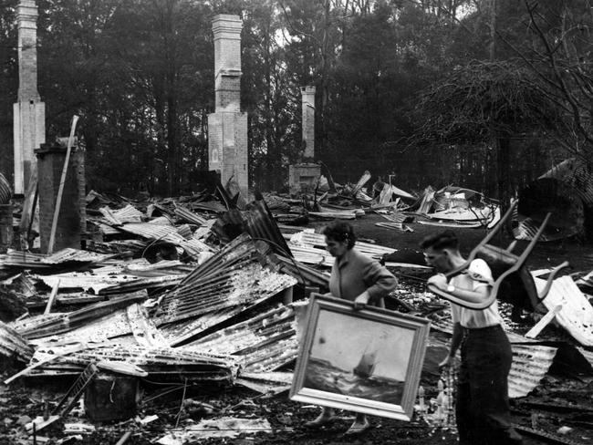 A painting and a chair are saved from the ruin of Cherry Farm at Kalorama.