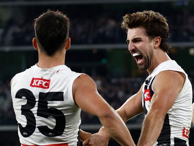 MELBOURNE, AUSTRALIA - MAY 03: Nick Daicos (left) and Josh Daicos of the Magpies celebrate during the 2024 AFL Round 08 match between the Carlton Blues and the Collingwood Magpies at The Melbourne Cricket Ground on May 03, 2024 in Melbourne, Australia. (Photo by Michael Willson/AFL Photos via Getty Images)