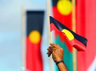 ROK-march09c Aboriginal flags fly during the Naidoc Week march through Rockhampton CHRIS ISON CI09-0710-5. Picture: Chris Ison