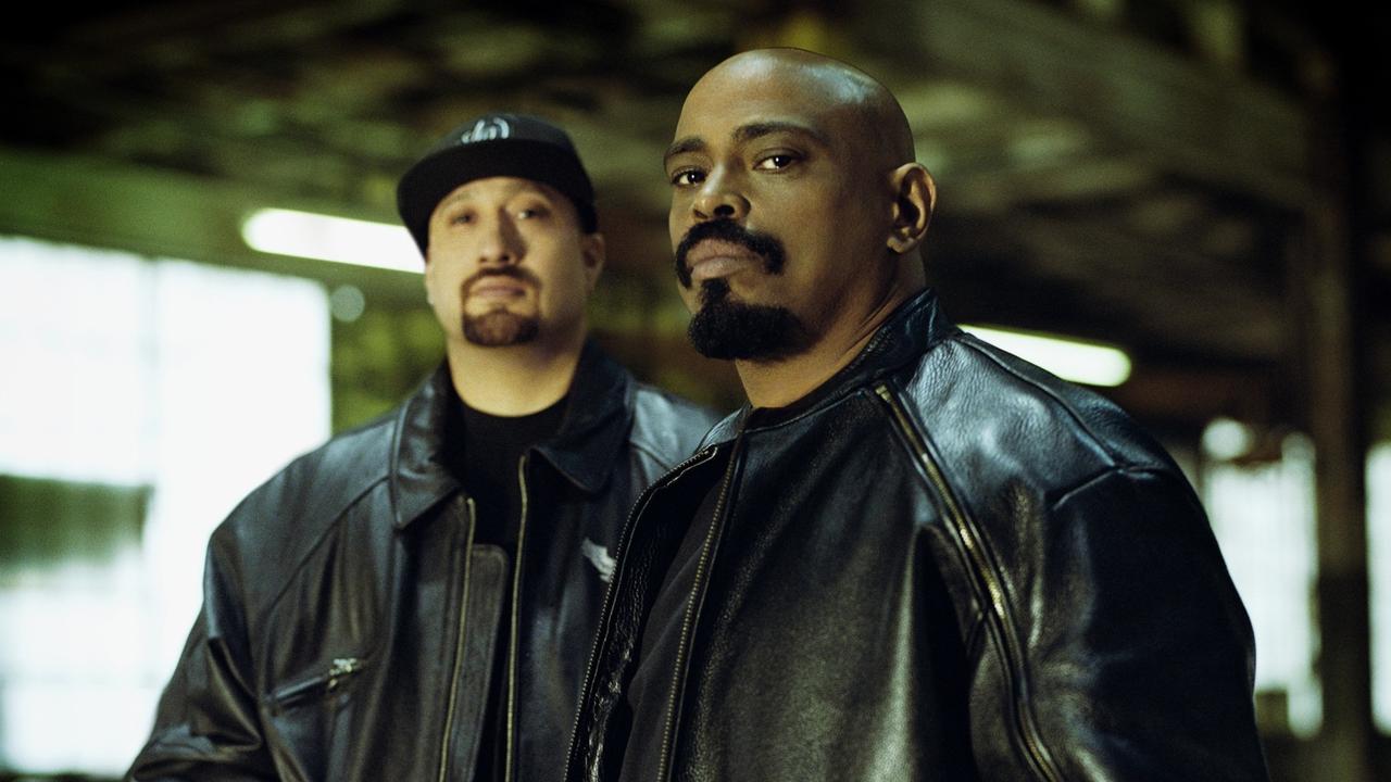 B-Real and Sen Dog from Cypress Hill.