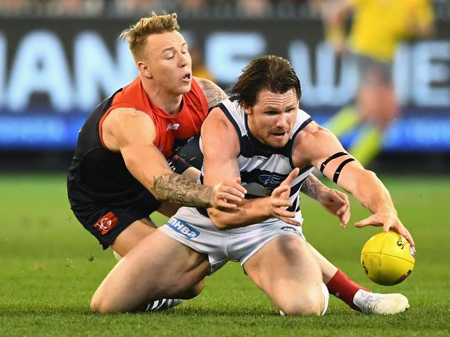 MELBOURNE, AUSTRALIA - SEPTEMBER 07:  James Harmes of the Demons and Patrick Dangerfield of the Cats compete for the ball during the AFL First Elimination Final match between the Melbourne Demons and the Geelong Cats at the Melbourne Cricket Ground on September 7, 2018 in Melbourne, Australia.  (Photo by Quinn Rooney/Getty Images)