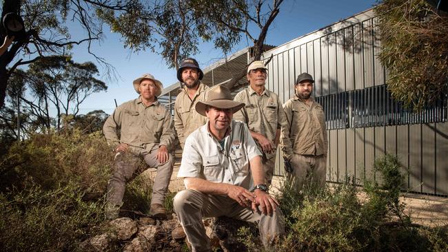 Wild Africa team member supervisor Tim Jenkins with fellow team members Dallas Binney, Mike Heath, David Wilson and Michael Holland at the partially built Lemur exhibit. Picture: Brad Fleet