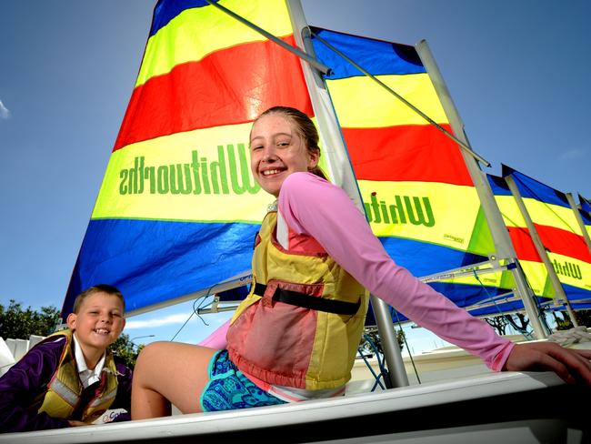 Hayden and Breanna test the waters while taking part in the Tackers Learn to Sail program.