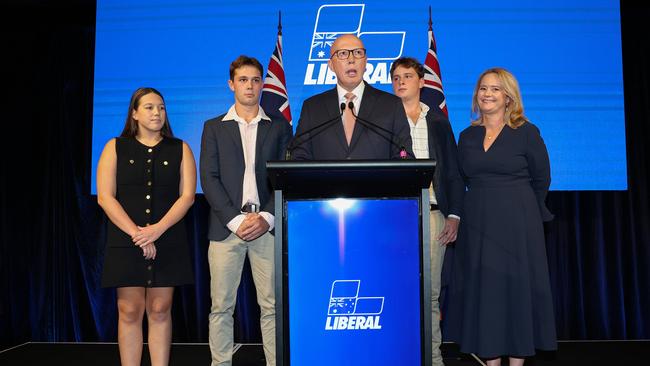 Peter Dutton, and his family, at the W Hotel in Brisbane on election night, as he delivers his concession speech. Picture: Adam Head