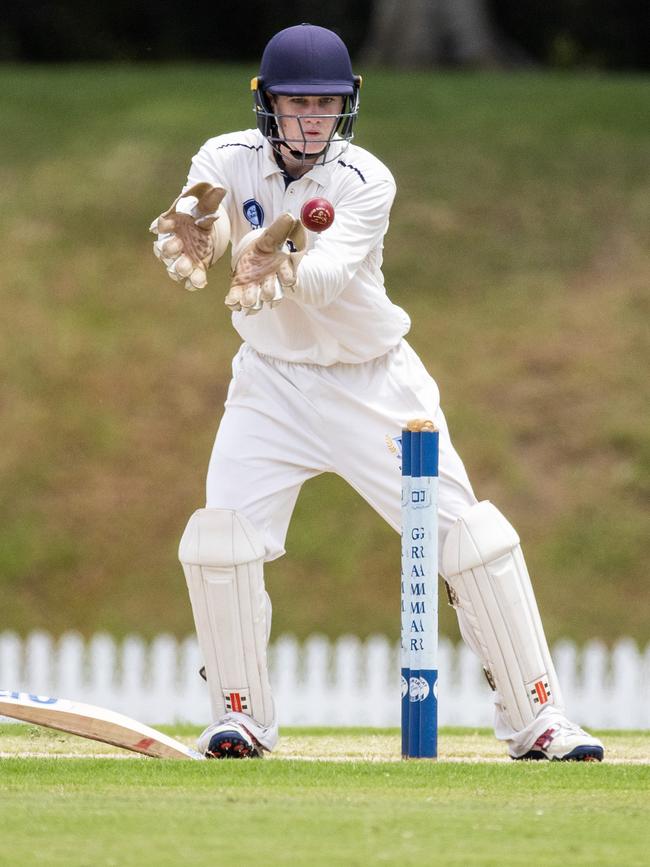 The glovework of Brisbane Grammar batting hero Matthew Lockhart. (AAP Image/Richard Walker)