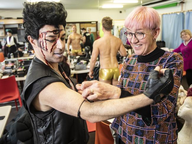 Rocky Horror costume designer Roz Wren does some final adjustments to another of the Rocky Horror Show cast member’s outfits. Picture Eddie Safarik