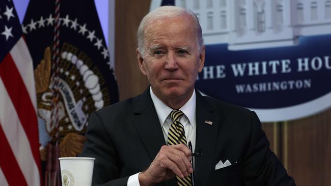 WASHINGTON, DC - OCTOBER 19: U.S. President Joe Biden listens during an event on the Bipartisan Infrastructure Law at the South Court Auditorium at Eisenhower Executive Office Building October 19, 2022 in Washington, DC. President Biden also participated in a virtual discussion with four Bipartisan Infrastructure Law grant award recipients during the event.   Alex Wong/Getty Images/AFP