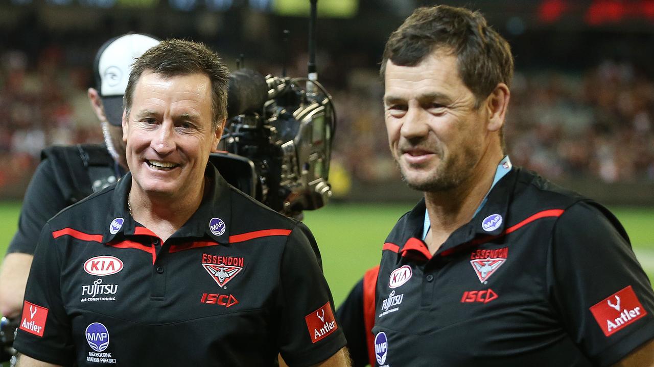 Mark Harvey, pictured with Essendon coach John Worsfold, says he still has plenty to give the game. Picture: Michael Klein