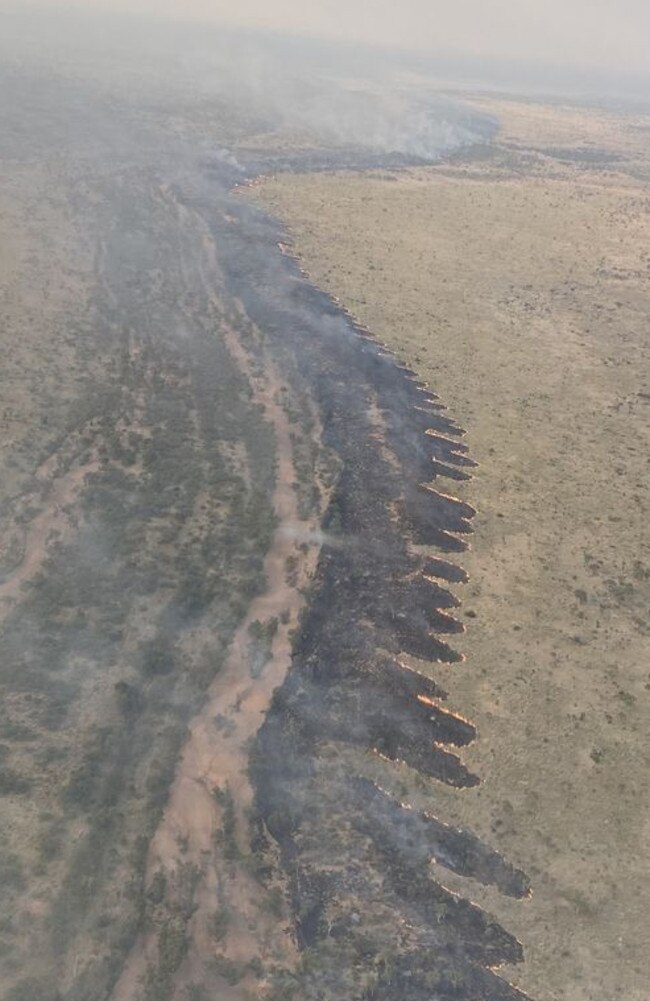 An aerial backburn using the Gosse River as a containment line. Picture: Bushfires NT