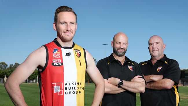 Goodwood Saints captain Lou Whitelock with coach Luke Donaldson and team manager Craig Kirkbright ahead of the Adelaide Footy League division one grand final. The trio says a victory would be dedicated to ex-teammate Shane Tuck who died earlier this year. Picture: Sarah Reed