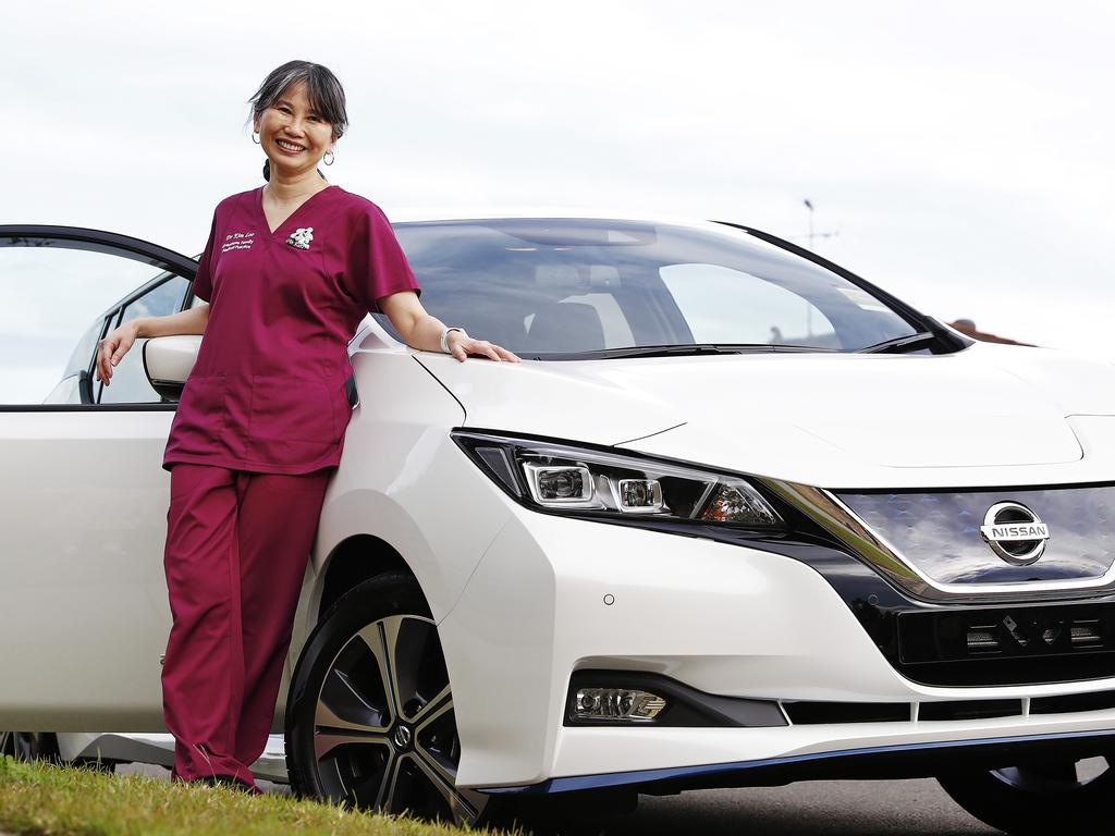 Dr Kim Loo with her new electric car. Picture: Sam Ruttyn