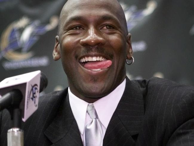 25/09/2001. FILE--Former basketball player Chicago Bulls' Michael Jordan smiles as he answers questions from the media Wednesday, Jan. 19, 2000 at the MCI Center in Washington. Jordan made his comeback official announcing he will return to play in the NBA and sign a two-year contract with the Washington Wizards. ``I am returning as a player to the game I love', said Jordan, 38 and more than three years removed from what seemed to be a storybook ending to his career. (AP Photo/Pablo Martinez Monsivais)